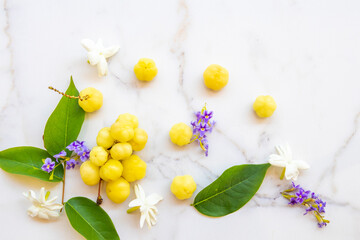 background texture super fruits star gooseberry healthy foods for diet with flower arrangement flat...