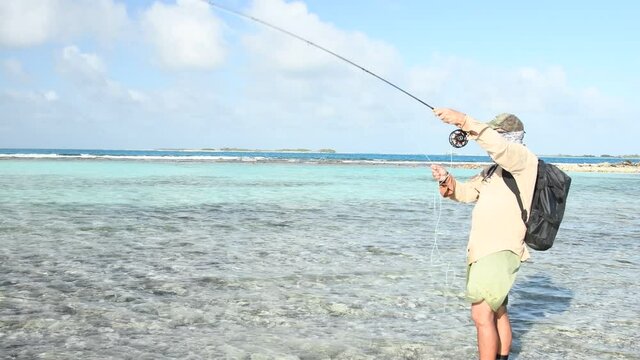 saltwater  fly fisherman cath bonefish fight