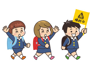 横断中の旗を持って歩く小学生　交通安全