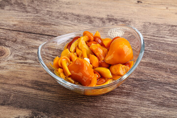 Marinated pickled honey mushrooms in the bowl