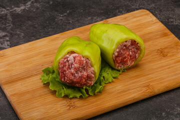Raw stuffed pepper for cooking