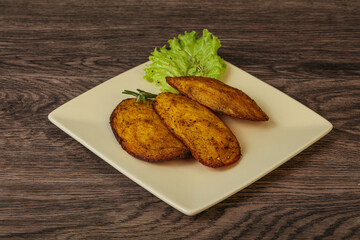 Baked potato with herbs and spices