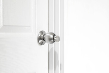 Installing locking knob with key at the door inside the home