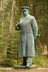 Druskininkai, Lithuania - May 1 2021: Stalin bronze sculpture in a park, Russian revolutionary,...