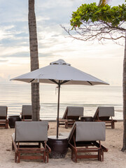 Beach bed at a seaside during sunrise in summer time