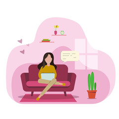 woman sitting on a sofa with a laptop