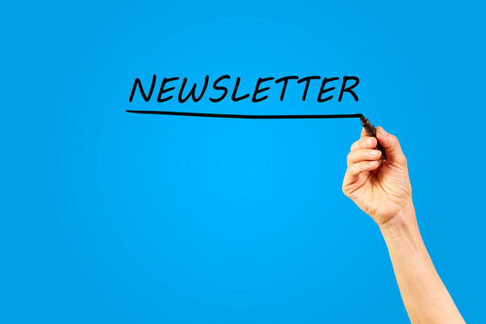 Hand of woman underlining the word Newletter on transparent panel