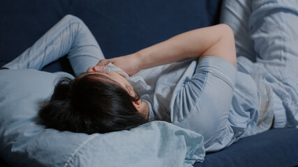 Depressed worried emotionally unstable vulnerable woman staring into space feeling upset about problems. Anxious female thinking of mental stress suffering from anxiety, loneliness, suicide thoughts