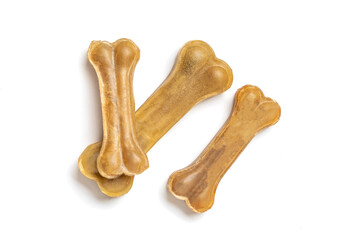 bone for dogs isolated on white background Top view Flat lay Delicious treat for your beloved pet Food for animals concept
