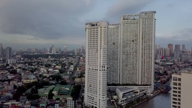 Mandaluyong, Metro Manila, Philippines - Aerial of a cluster of high end condominium skyscrapers near the Pasig River..