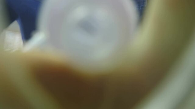 Eye view on anesthesiologist with resuscitation breathing bag or Ambu bag in hands. Life saving. rescue patients in emergency. Mask for artificial lungs ventilation. Breathing bag with valve inflates