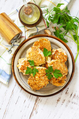 Healthy vegan food. Tasty homemade Red fish cutlets on a wooden rustic table. Top view, flat lay background. Copy space.