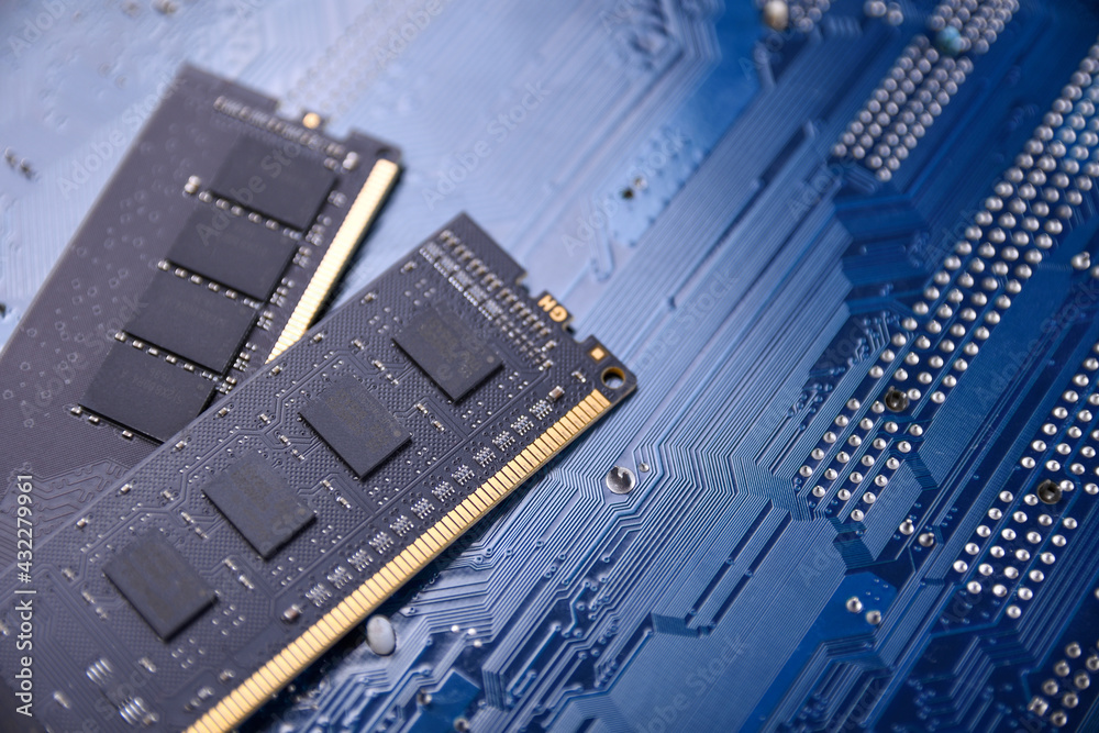 Poster Computer memory RAM on motherboard background . Close up. system, main memory, random access memory, onboard, computer detail. Computer components . DDR3. DDR4. DDR5