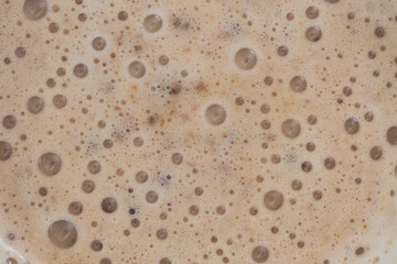 Close up view of the texture of a delicious cappuccino coffee.
