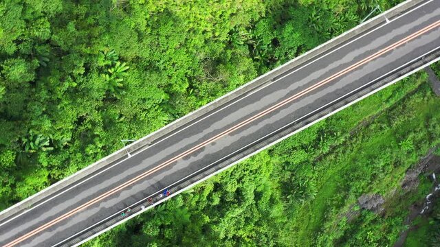 Agas-Agas Bridge, Sogod, Southern Leyte, Philippines - Top View Of Drone Rotating Above Agas Agas Bridge With Vehicles Passing By And People Standing At The Side Of The Bridge - Aerial Shot