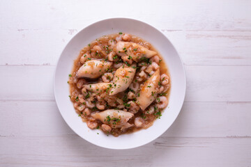 Squid stew. Traditional tapas from southern Spain in a fishing village.