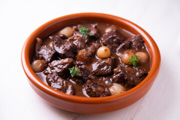 Beef stew with onions. Traditional Spanish tapa.