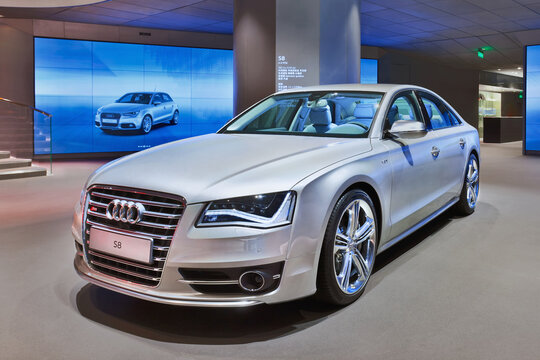 BEIJING-APRIL 16, 2013. Audi S8 in a showroom. In recent years non-German global brands like Cadillac, Lexus and Infiniti challenged the grip Audi, BMW and Mercedes-Benz maintain on China's market.