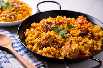 Traditional paella from a restaurant in the famous Rambla de Barcelona. Cooked with vegetables and chicken.
