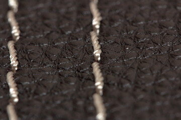high-quality genuine leather texture with decorative seam