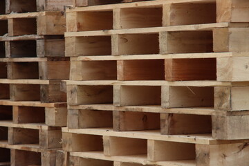 Piles of wooden transport Pallets