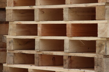 Piles of wooden transport Pallets