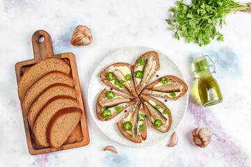 Fish sandwiches with sprats.