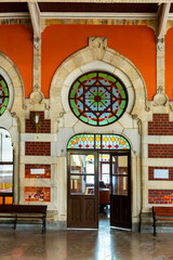 Fototapeta na wymiar Architectural elements in Ottoman style decorating historic building of Sirkeci railway Terminal in Istanbul, Turkey