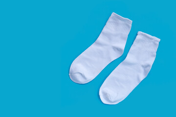 White socks on blue background.