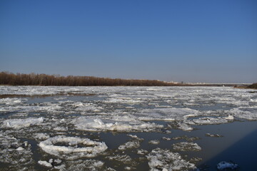 the surface of the water on the river during the ice drift close-up