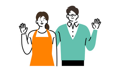 手をあげている夫婦