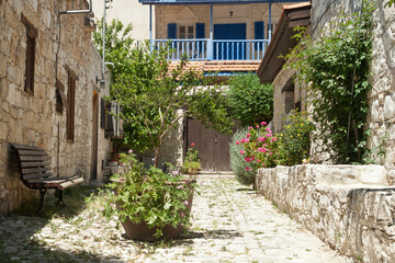 Fototapeta na wymiar Cobbled street with old stone houses