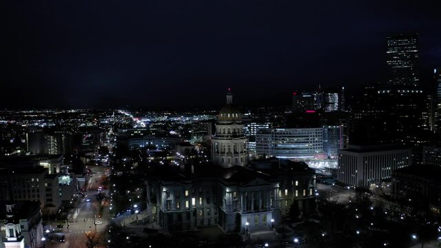 Aerial Shot Of Illuminated Colorado State Capitol In City At Night - Denver, Colorado