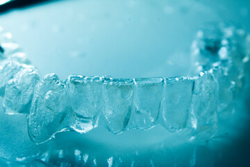 Invisible bracket aligners