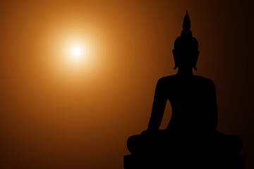 Silhouette Buddha on golden sunset background.