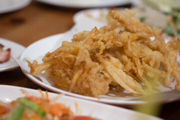 Deep fried papaya salad