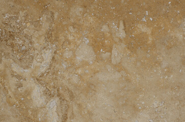 Brown and beige granite texture. Stone background. Polished natural granite slab.