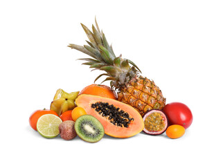 Pile of different exotic fruits on white background