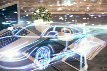 Double exposure of automobile theme sketch over cell phone background. Concept of technology