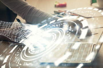 Multi exposure of woman hands working on computer and data theme hologram drawing. Tech concept.