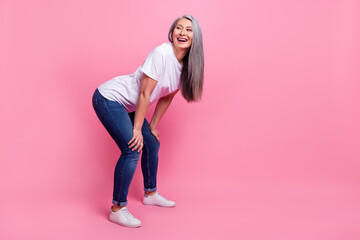 Full length body size photo of woman dancing spending looking copyspace isolated pastel pink color background