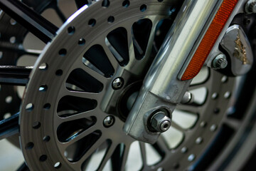 Fototapeta na wymiar steel disc from motorcycle wheel close-up.
