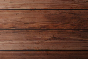 Dark brown wood background texture with copy space. Top view of old wooden background. Grunge textured wood. Scratched wooden table top view. 