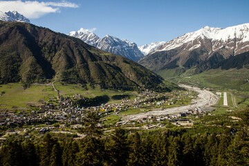 Fototapeta na wymiar view from the mountain to the village in the mountains
