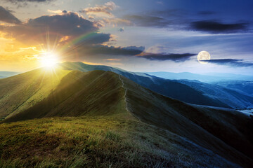 day and night time change concept above mountain landscape in summer. grassy meadows on the hills...