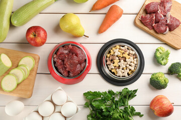 Pet food and natural ingredients on white wooden table, flat lay