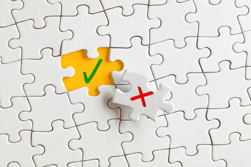 Check mark (right) and cross mark (wrong) on the missing puzzle pieces. To discover or expose the...