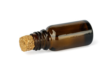 cosmetic bottle with cork stopper on a white. brown bottle full of liquid used in cosmetics and medicine.