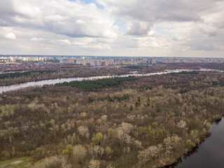 Fototapeta premium Dnieper river in Kiev in the afternoon. Aerial drone view.