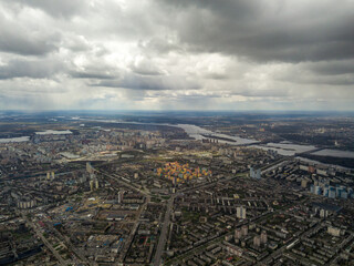 Fototapeta na wymiar The city of Kiev in cloudy weather. Aerial high view.